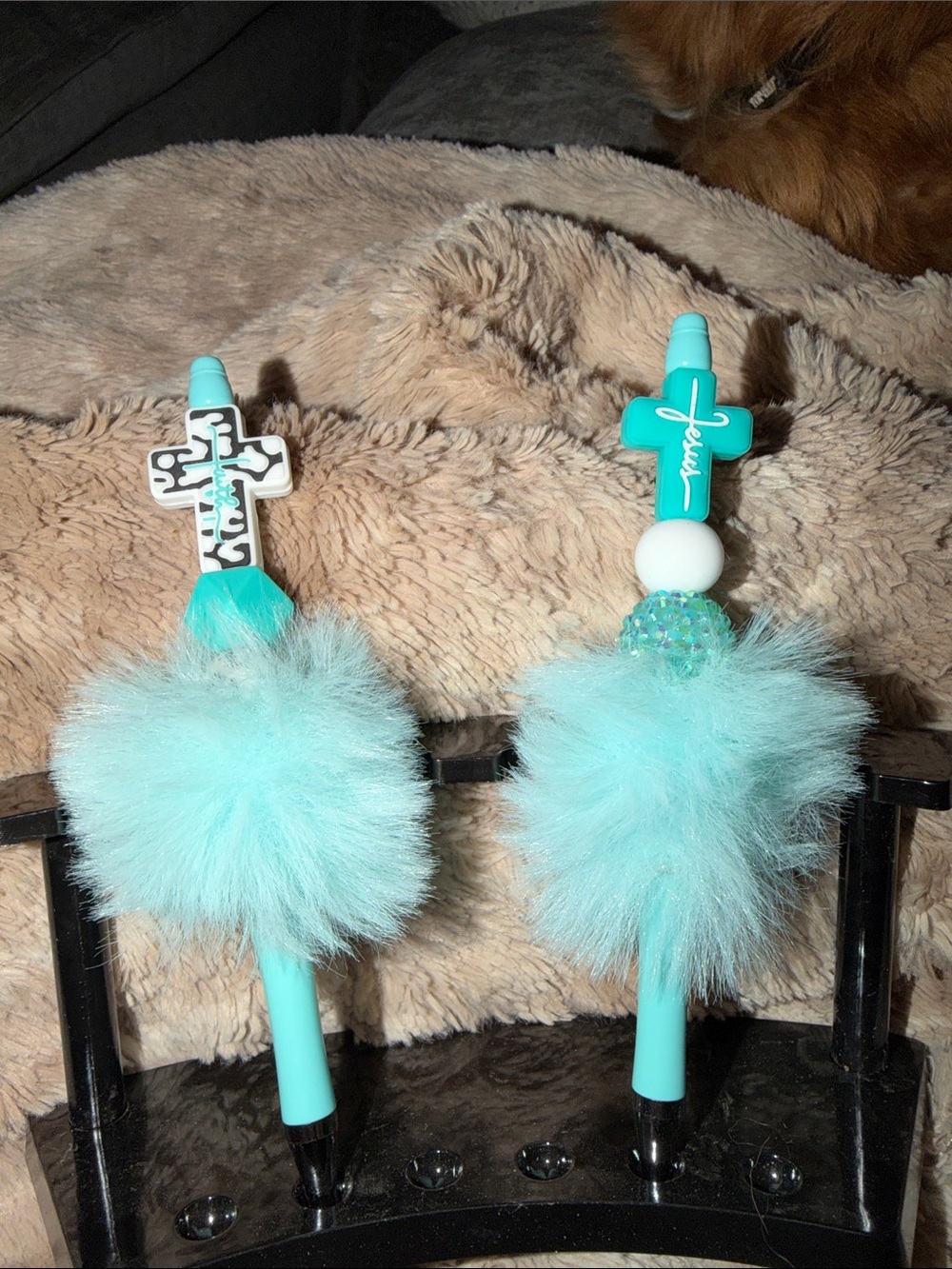 FAITH Fluffy Teal Cross Top Pen – $12 Each. Features Turquoise Puff Accessory